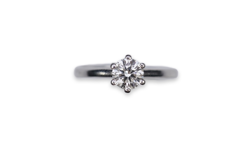 A diamond solitaire ring